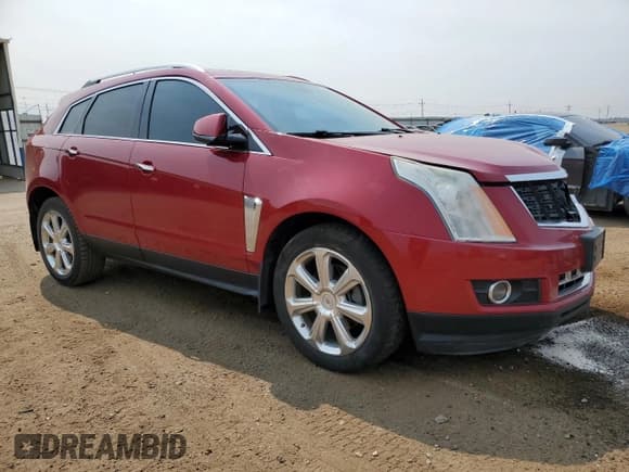 ✅ 2015 Cadillac SRX Performance Collection • VIN: 3GYFNFE33FS575254 • Lot: 67310025. Wystawiony na Copart z przebiegiem 67 839 mil. Bezpłatny archiwum sprzedaży aukcyjnych z USA i szczegółowy raport historii pojazdu na DreamBid. Zdjęcie 4.