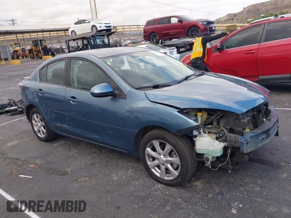 ✅ 2010 Mazda 3 i Touring • VIN: JM1BL1SG8A1316290 • Lot: 43325076. Listed on IAAI with 124,677 mi. Free auction sales archive from the USA and detailed vehicle history report at DreamBid. Image 1.