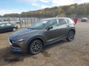 ✅ 2018 Mazda CX-5 Touring • VIN: JM3KFBCM3J0398105 • Lot: 43609194. Wystawiony na IAAI z przebiegiem 64 706 mil. Bezpłatny archiwum sprzedaży aukcyjnych z USA i szczegółowy raport historii pojazdu na DreamBid. Zdjęcie 2.