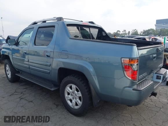 ✅ 2006 Honda Ridgeline RTL • VIN: 2HJYK16506H571672 • Lot: 43669473. Listed on IAAI with 84,578 mi. Free auction sales archive from the USA and detailed vehicle history report at DreamBid. Image 3.