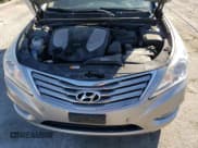 ✅ 2013 Hyundai Azera • VIN: KMHFG4JG8DA256908 • Lot: 50573915. Listed on Copart with 146,015 mi. Free auction sales archive from the USA and detailed vehicle history report at DreamBid. Image 11.