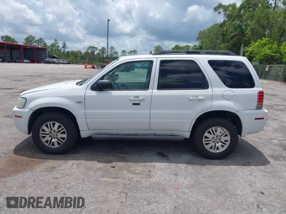 2006 Mercury Mariner Luxury с VIN 4M2YU56116KJ14472, выставлен на аукционе IAAI как лот 42349564 с пробегом 96 221 миль миль и . История ставок и продаж доступна на DreamBid. Изображение 14.