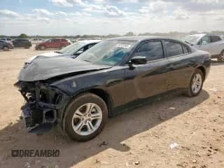 2022 Dodge Charger SXT with VIN 2C3CDXBG6NH208296, listed as a Copart auction lot 80763365 with 60,288 mi miles and Salvage title. Bid and sale history available at DreamBid. Image 1.