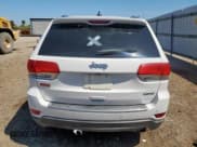 ✅ 2015 Jeep Grand Cherokee Limited • VIN: 1C4RJEBG4FC199654 • Lot: 83816755. Listed on Copart with 211,220 mi. Free auction sales archive from the USA and detailed vehicle history report at DreamBid. Image 6.