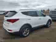 2018 Hyundai Santa Fe 2.4L z VIN 5XYZUDLB8JG536576, wystawiony jako Copart lot #89845255 z przebiegiem 152 793 mil mil oraz Czysty tytuł • Clean title. Historia ofert i sprzedaży dostępna na DreamBid. Obrazek 3.