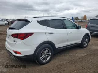 ✅ 2018 Hyundai Santa Fe 2.4L • VIN: 5XYZUDLB8JG536576 • Лот: 89845255. Опубликован ранее на Copart с пробегом 152 793 миль. Бесплатный доступ к архиву аукционных продаж из США и подробный отчёт об истории автомобиля на DreamBid. Изображение 3.