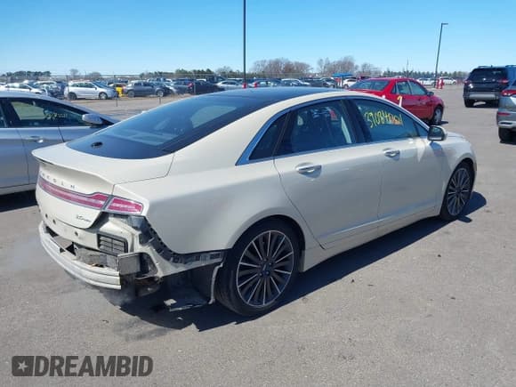 ✅ 2014 Lincoln MKZ • VIN: 3LN6L2G9XER820400 • Lot: 42195277. Wystawiony na IAAI z przebiegiem 48 597 mil. Bezpłatny archiwum sprzedaży aukcyjnych z USA i szczegółowy raport historii pojazdu na DreamBid. Zdjęcie 4.