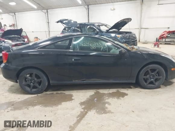 ✅ 2000 Toyota Celica GTS • VIN: JTDDY32T1Y0003665 • Lot: 42340293. Listed on IAAI with 206,239 mi. Free auction sales archive from the USA and detailed vehicle history report at DreamBid. Image 13.