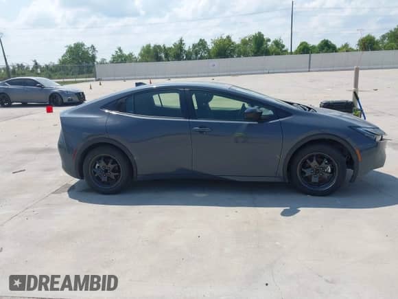 2024 Toyota Prius LE with VIN JTDACAAUXR3032131, listed as a IAAI auction lot 43231631 with 15,535 mi miles and . Bid and sale history available at DreamBid. Image 13.