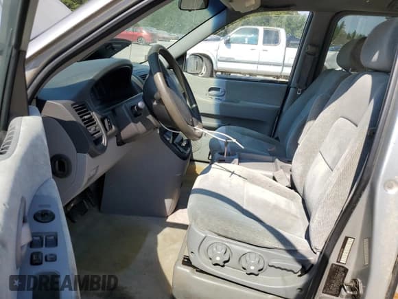 ✅ 2005 Kia Sedona LX • VIN: KNDUP131956617683 • Lot: 71478805. Wystawiony na Copart z przebiegiem 210 366 mil. Bezpłatny archiwum sprzedaży aukcyjnych z USA i szczegółowy raport historii pojazdu na DreamBid. Zdjęcie 7.