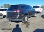 ✅ 2014 Chevrolet Traverse LT • VIN: 1GNKRHKD0EJ373612 • Lot: 43812609. Listed on IAAI with 161,104 mi. Free auction sales archive from the USA and detailed vehicle history report at DreamBid. Image 4.