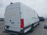 ✅ 2022 Mercedes-Benz Sprinter Cargo • VIN: W1Y4EDHY7NT091581 • Lot: 42478500. Listed on IAAI with 67,897 mi. Free auction sales archive from the USA and detailed vehicle history report at DreamBid. Image 4.