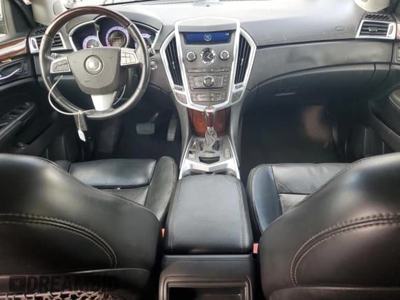 ✅ 2012 Cadillac SRX Performance Collection • VIN: 3GYFNBE31CS577198 • Lot: 81932555. Listed on Copart with 194,810 mi. Free auction sales archive from the USA and detailed vehicle history report at DreamBid. Image 8.