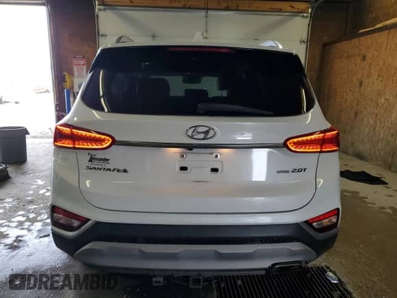 2019 Hyundai Santa Fe Limited с VIN 5NMS5CAA3KH120333, выставлен на аукционе Copart как лот 84250895 с пробегом 69 679 миль миль и Списание • Salvage title. История ставок и продаж доступна на DreamBid. Изображение 6.