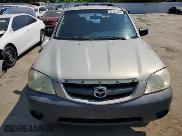 ✅ 2004 Mazda Tribute DX • VIN: 4F2YZ02B74KM13874 • Лот: 65422864. Опубликован ранее на Copart с пробегом 288 215 миль. Бесплатный доступ к архиву аукционных продаж из США и подробный отчёт об истории автомобиля на DreamBid. Изображение 5.