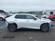 ✅ 2025 Lexus RZ 450e Premium • VIN: JTJAAAAB7SA028301 • Лот: 42518068. Опубликован ранее на IAAI с пробегом 1 244 миль. Бесплатный доступ к архиву аукционных продаж из США и подробный отчёт об истории автомобиля на DreamBid. Изображение 14.