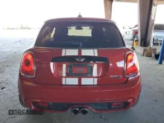 2014 MINI Hardtop S with VIN WMWXM7C56ET988018, listed as a Copart auction lot 64136785 with 73,870 mi miles and Salvage title. Bid and sale history available at DreamBid. Image 6.