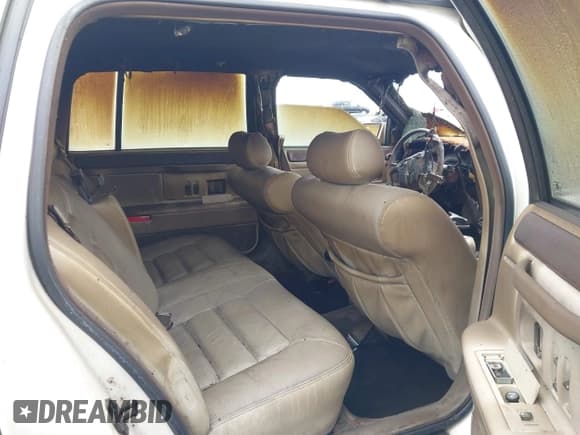 ✅ 1995 Cadillac DeVille • VIN: 1G6KD52B7SU308452 • Лот: 42964215. Опубликован ранее на IAAI с пробегом Не указан. Бесплатный доступ к архиву аукционных продаж из США и подробный отчёт об истории автомобиля на DreamBid. Изображение 8.