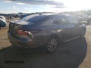 ✅ 2022 Toyota Camry LE • VIN: 4T1C11AK5NU657176 • Lot: 86294235. Wystawiony na Copart z przebiegiem 107 339 mil. Bezpłatny archiwum sprzedaży aukcyjnych z USA i szczegółowy raport historii pojazdu na DreamBid. Zdjęcie 3.