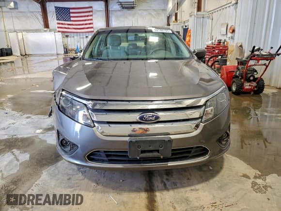 ✅ 2012 Ford Fusion SE • VIN: 3FAHP0HA9CR281396 • Lot: 94140105. Wystawiony na Copart z przebiegiem 171 151 mil. Bezpłatny archiwum sprzedaży aukcyjnych z USA i szczegółowy raport historii pojazdu na DreamBid. Zdjęcie 5.