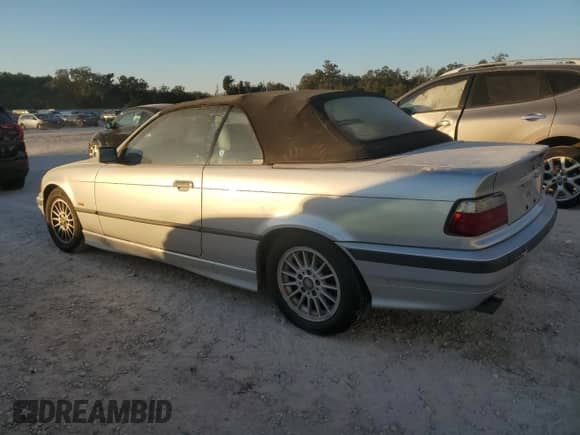 1998 BMW 3 Series 328i с VIN WBABK8330WEY89818, выставлен на аукционе Copart как лот 41557015 с пробегом 253 522 миль миль и На запчасти • Non repairable. История ставок и продаж доступна на DreamBid. Изображение 2.