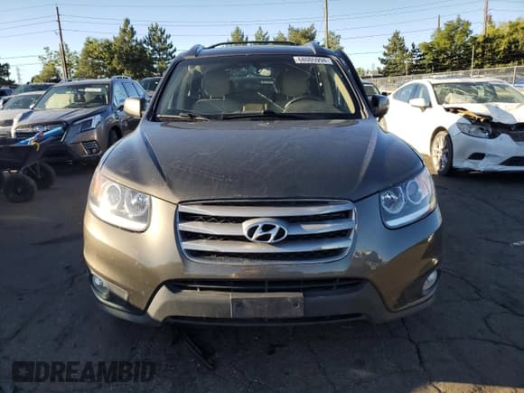 ✅ 2012 Hyundai Santa Fe Limited • VIN: 5XYZKDAGXCG157182 • Lot: 68005994. Listed on Copart with 66,436 mi. Free auction sales archive from the USA and detailed vehicle history report at DreamBid. Image 5.