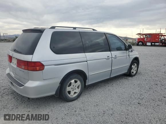 ✅ 2001 Honda Odyssey EX • VIN: 2HKRL18631H604112 • Лот: 71748595. Опубликован ранее на Copart с пробегом 156 569 миль. Бесплатный доступ к архиву аукционных продаж из США и подробный отчёт об истории автомобиля на DreamBid. Изображение 3.