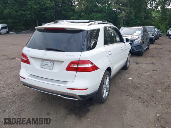 ✅ 2014 Mercedes-Benz M 350 • VIN: 4JGDA5HB0EA397515 • Lot: 42491949. Listed on IAAI with 126,427 mi. Free auction sales archive from the USA and detailed vehicle history report at DreamBid. Image 4.