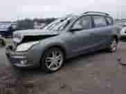 2010 Hyundai Elantra SE with VIN KMHDC8AE6AU068617, listed as a Copart auction lot 69657295 with 84,999 mi miles and Salvage title. Bid and sale history available at DreamBid. Image 1.