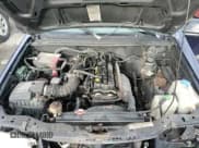 ✅ 2000 Suzuki Vitara JX • VIN: 2S3TD52V6Y6111082 • Lot: 82444534. Wystawiony na Copart z przebiegiem 271 122 mil. Bezpłatny archiwum sprzedaży aukcyjnych z USA i szczegółowy raport historii pojazdu na DreamBid. Zdjęcie 12.