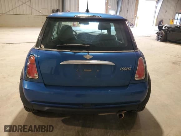 ✅ 2006 MINI Hardtop • VIN: WMWRC33506TJ77806 • Lot: 60921115. Listed on Copart with 86,927 mi. Free auction sales archive from the USA and detailed vehicle history report at DreamBid. Image 6.