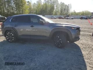 ✅ 2025 Mazda CX-50 Hybrid Premium Plus Package • VIN: 7MMVAAEW8SN101542 • Lot: 53911805. Wystawiony na Copart z przebiegiem Nie podano. Bezpłatny archiwum sprzedaży aukcyjnych z USA i szczegółowy raport historii pojazdu na DreamBid. Zdjęcie 4.