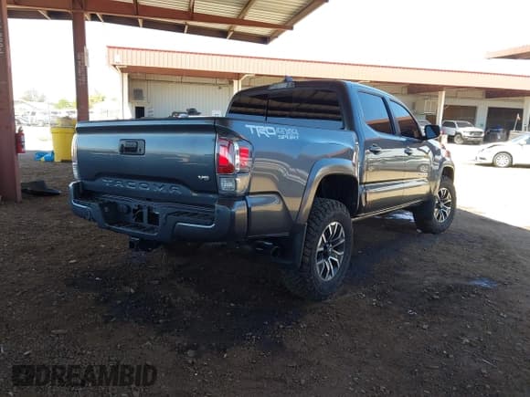 ✅ 2023 Toyota Tacoma SR • VIN: 3TMCZ5AN6PM577729 • Lot: 42164920. Listed on IAAI with 33,629 mi. Free auction sales archive from the USA and detailed vehicle history report at DreamBid. Image 4.