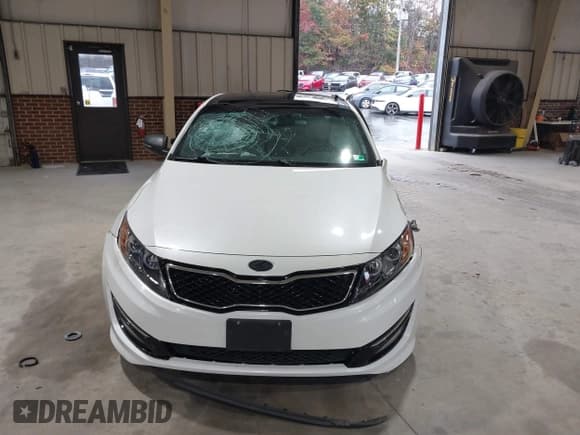 ✅ 2013 Kia Optima SX • VIN: 5XXGR4A64DG217831 • Lot: 43522692. Listed on IAAI with 130,441 mi. Free auction sales archive from the USA and detailed vehicle history report at DreamBid. Image 12.