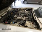 ✅ 1989 Jaguar XJS • VIN: SAJNV4847KC164497 • Lot: 87258504. Listed on Copart with 90,299 mi. Free auction sales archive from the USA and detailed vehicle history report at DreamBid. Image 12.