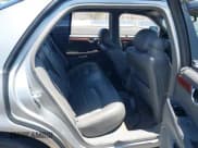 ✅ 2005 Cadillac DeVille • VIN: 1G6KD54Y35U261099 • Lot: 42530522. Listed on IAAI with 176,141 mi. Free auction sales archive from the USA and detailed vehicle history report at DreamBid. Image 8.