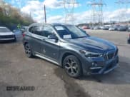 ✅ 2017 BMW X1 xDrive28i • VIN: WBXHT3C32H5F83225 • Lot: 43627998. Listed on IAAI with 131,392 mi. Free auction sales archive from the USA and detailed vehicle history report at DreamBid. Image 1.
