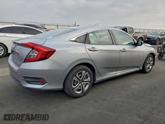 ✅ 2016 Honda Civic LX • VIN: 19XFC2F55GE214936 • Lot: 94490495. Listed on Copart with 105,352 mi. Free auction sales archive from the USA and detailed vehicle history report at DreamBid. Image 3.