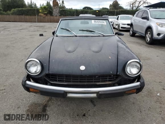 ✅ 1976 FIAT 124 Spider • VIN: 124CS10107235 • Lot: 86426594. Listed on Copart with 83,804 mi. Free auction sales archive from the USA and detailed vehicle history report at DreamBid. Image 5.