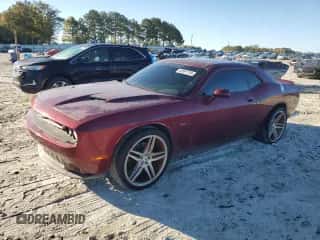2018 Dodge Challenger GT z VIN 2C3CDZGG3JH133006, wystawiony jako Copart lot #86991785 z przebiegiem 156 404 mil mil oraz Czysty tytuł • Clean title. Historia ofert i sprzedaży dostępna na DreamBid. Obrazek 1.