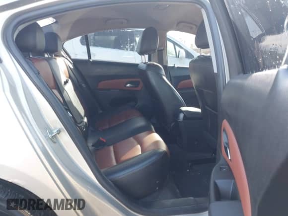 2014 Chevrolet Cruze 2LT with VIN 1G1PE5SBXE7257699, listed as a IAAI auction lot 43514227 with 131,115 mi miles and . Bid and sale history available at DreamBid. Image 8.