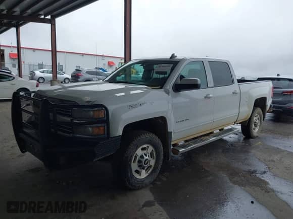 2016 Chevrolet Silverado 2500HD LT z VIN 1GC1KVEG9GF129704, wystawiony jako IAAI lot #43504239 z przebiegiem 230 456 mil mil oraz . Historia ofert i sprzedaży dostępna na DreamBid. Obrazek 2.