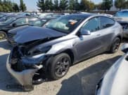 ✅ 2025 Tesla Model Y Long Range • VIN: 7SAYGDED4SF320852 • Лот: 82130155. Опубликован ранее на Copart с пробегом 7 011 миль. Бесплатный доступ к архиву аукционных продаж из США и подробный отчёт об истории автомобиля на DreamBid. Изображение 1.