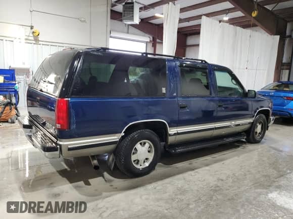 1998 Chevrolet Suburban с VIN 1GNEC16R5WJ361307, выставлен на аукционе Copart как лот 85717335 с пробегом 29 147 миль миль и Списание • Salvage title. История ставок и продаж доступна на DreamBid. Изображение 3.