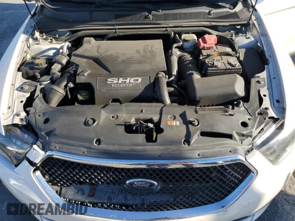 ✅ 2013 Ford Taurus SHO • VIN: 1FAHP2KT4DG140508 • Lot: 82628395. Listed on Copart with 148,897 mi. Free auction sales archive from the USA and detailed vehicle history report at DreamBid. Image 11.