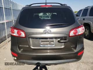 ✅ 2012 Hyundai Santa Fe GLS • VIN: 5XYZGDAB2CG152841 • Lot: 69445724. Listed on Copart with 131,617 mi. Free auction sales archive from the USA and detailed vehicle history report at DreamBid. Image 6.
