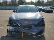 ✅ 2021 BMW X1 xDrive28i • VIN: WBXJG9C05M5S71244 • Лот: 65514385. Опубликован ранее на Copart с пробегом 23 297 миль. Бесплатный доступ к архиву аукционных продаж из США и подробный отчёт об истории автомобиля на DreamBid. Изображение 5.