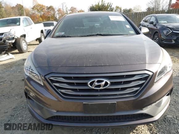 ✅ 2015 Hyundai Sonata Sport • VIN: 5NPE34AB6FH084163 • Lot: 43640225. Listed on IAAI with 234,665 mi. Free auction sales archive from the USA and detailed vehicle history report at DreamBid. Image 12.
