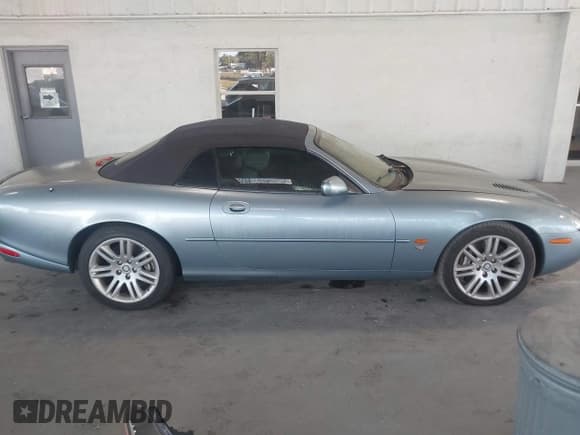 ✅ 2003 Jaguar XK • VIN: SAJDA42BX33A34653 • Лот: 43802371. Опубликован ранее на IAAI с пробегом 112 992 миль. Бесплатный доступ к архиву аукционных продаж из США и подробный отчёт об истории автомобиля на DreamBid. Изображение 13.