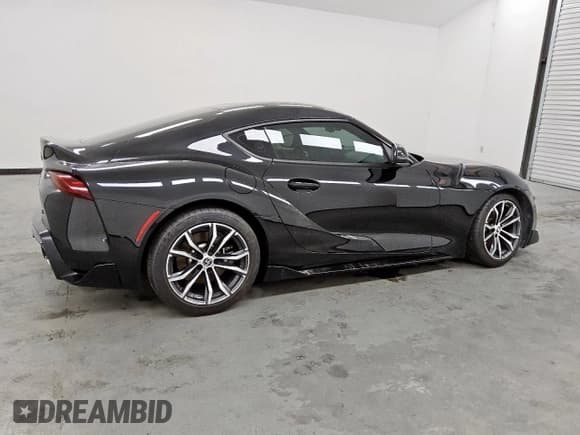 ✅ 2023 Toyota Supra 2.0 • VIN: WZ1DB2G02PW056768 • Lot: 85255325. Listed on Copart with 21,985 mi. Free auction sales archive from the USA and detailed vehicle history report at DreamBid. Image 3.